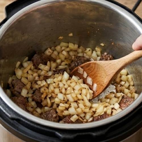 Step 4: Sauté the Onions Step 4: Sauté the Onions