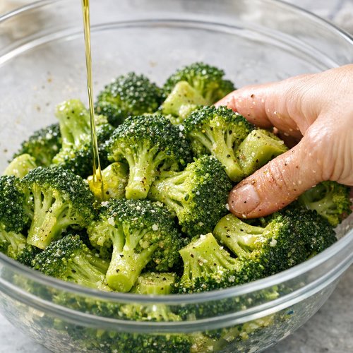 Step 2: Coat Your Broccoli with Oil and Seasonings